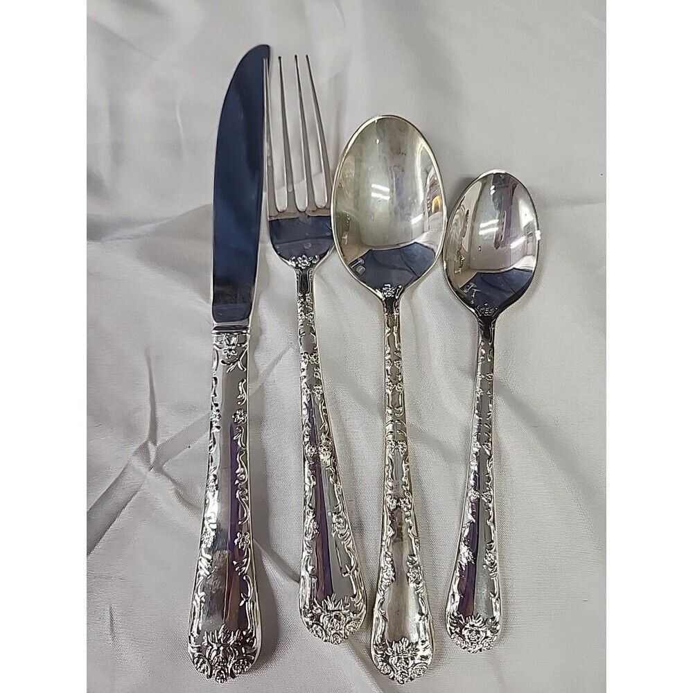 International WM Rogers ENCHANTED ROSE Service For 8 except for missing 2 knives